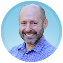 Headshot of our Graphic Designer, Mark Hébert