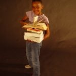 photo of a girl with school books