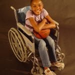 photo of a girl in a wheelchair