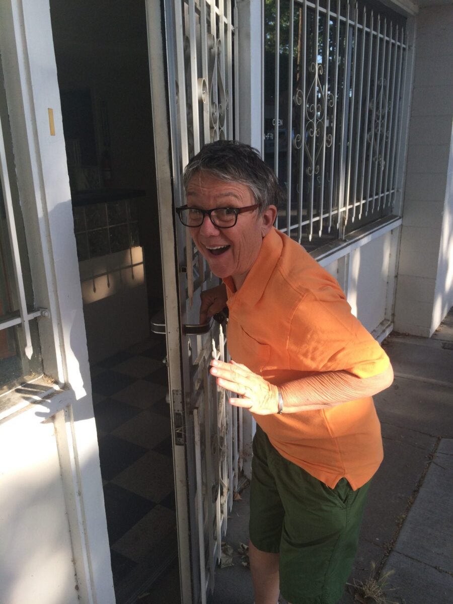 Tina opening door