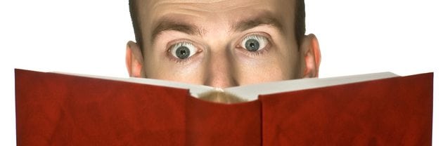 An image of a man reading