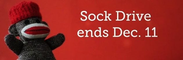 an image of a sock monkey on a red background