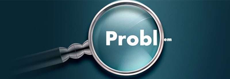 a graphic of a magnifying glass over the top of the word Problems