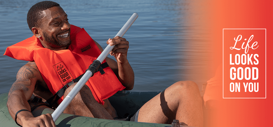Man Sitting In Raft Holding Oar Smiling Wearing Life Looks Good On You Life Jacket