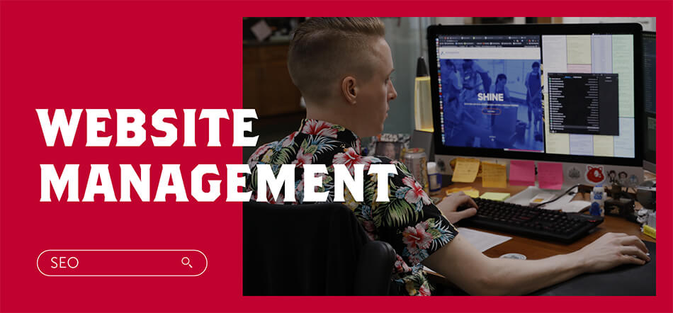 Sacramento Website Management With Person In Background Working On Website Code With SEO Search Bar On The Bottom