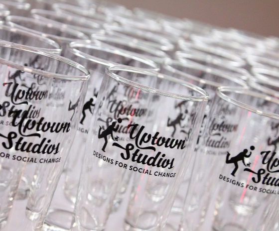 Shot Glasses with the uptown studios logo