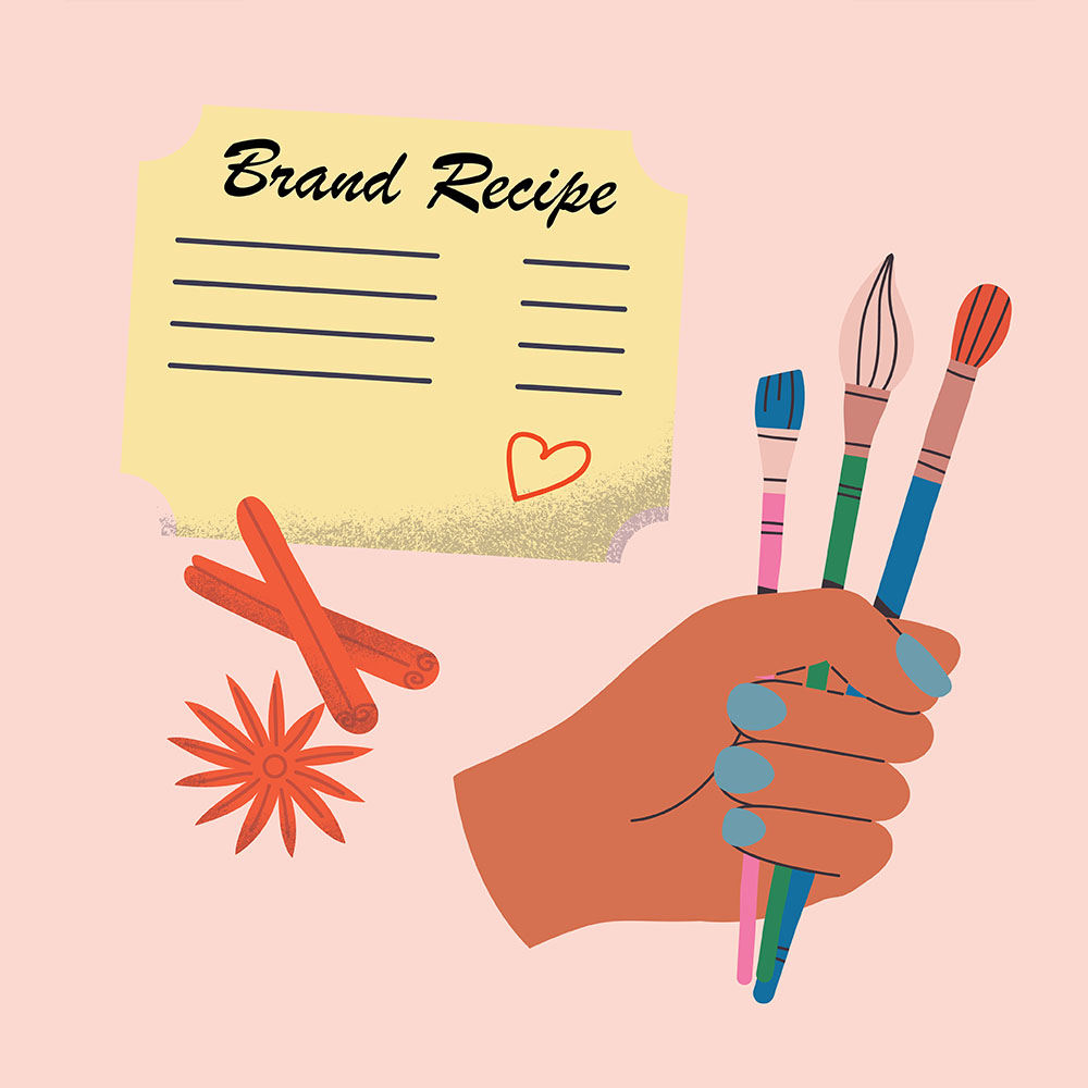 A graphic of a hand holding some brushes